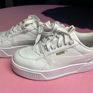 Puma Women's White Sneakers with Gold Logo